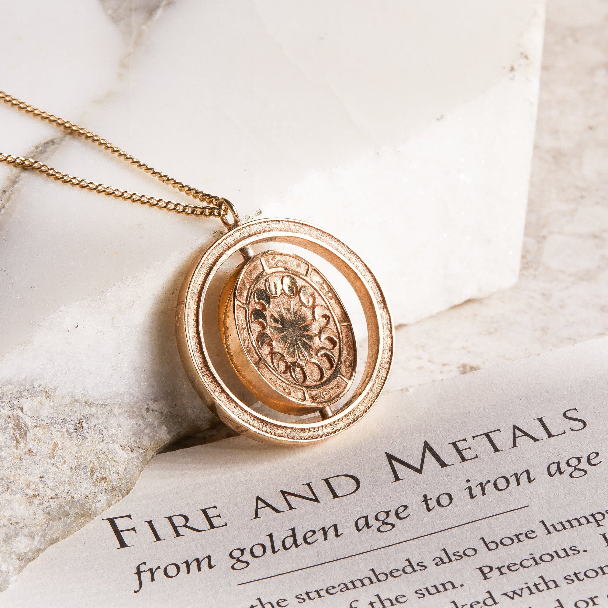 Alchemist's Spinning Necklace with Emerald Solid Gold