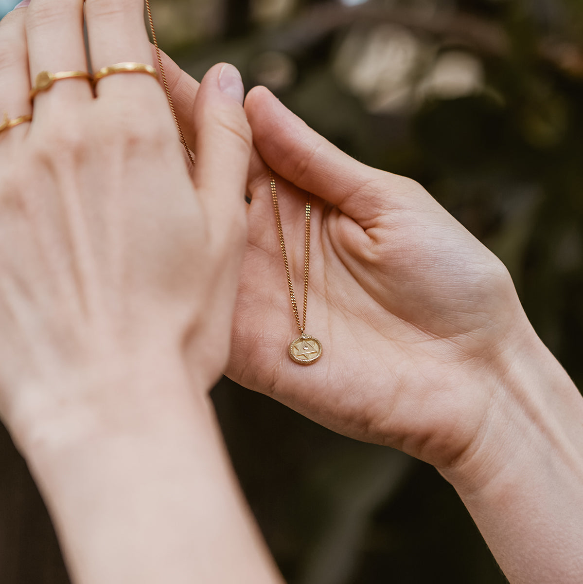 Ouroboros Necklace with Emerald Solid Gold